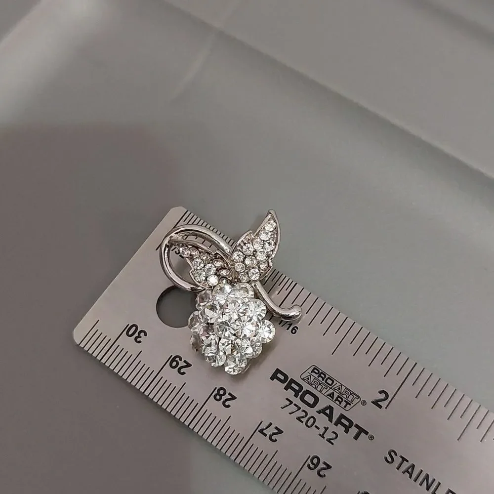 Vintage Unknown Mark Rhinestone Crystals Flower Stem Silver Tone Lapel Pin